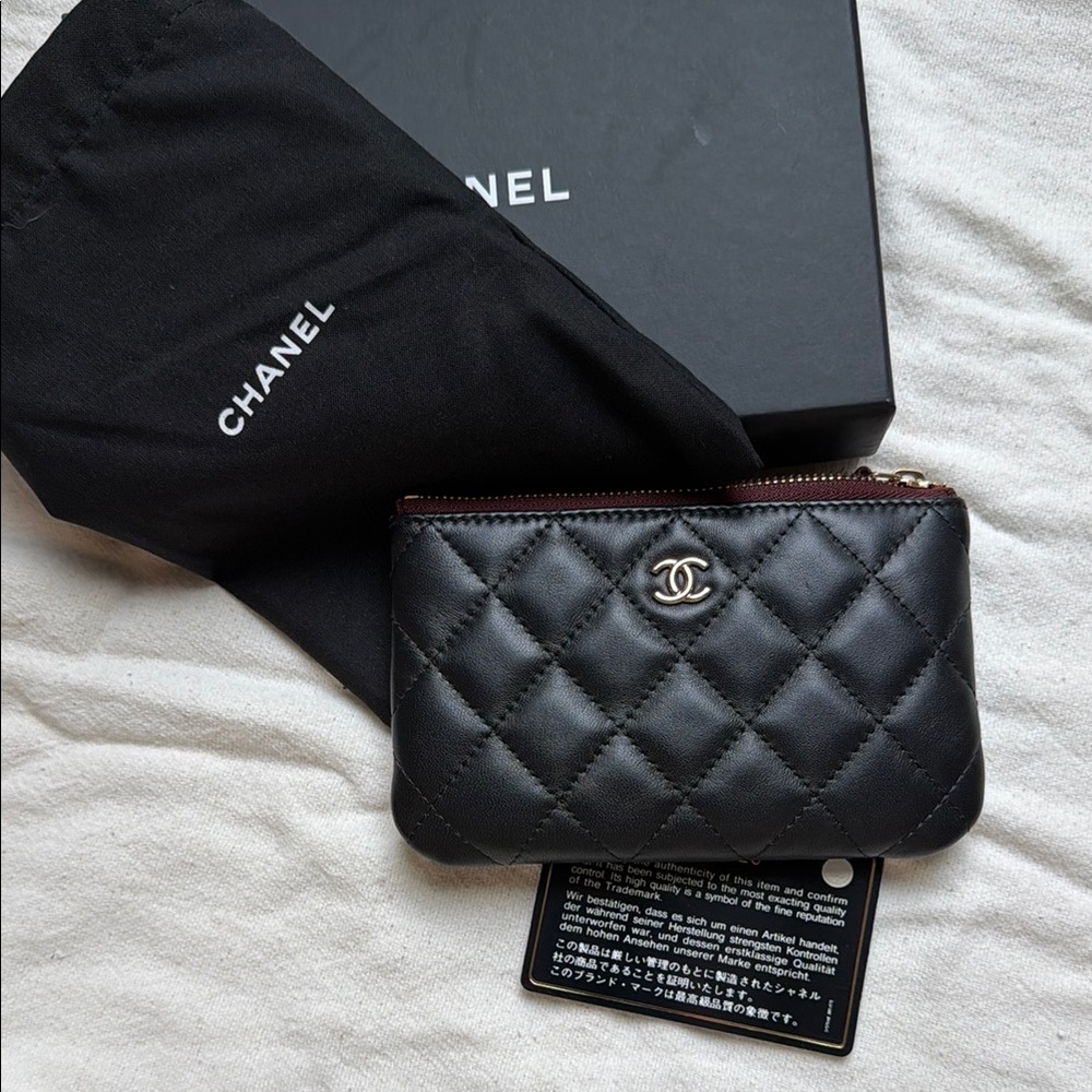 CHANEL Black lambskin Pouch with gold hardware